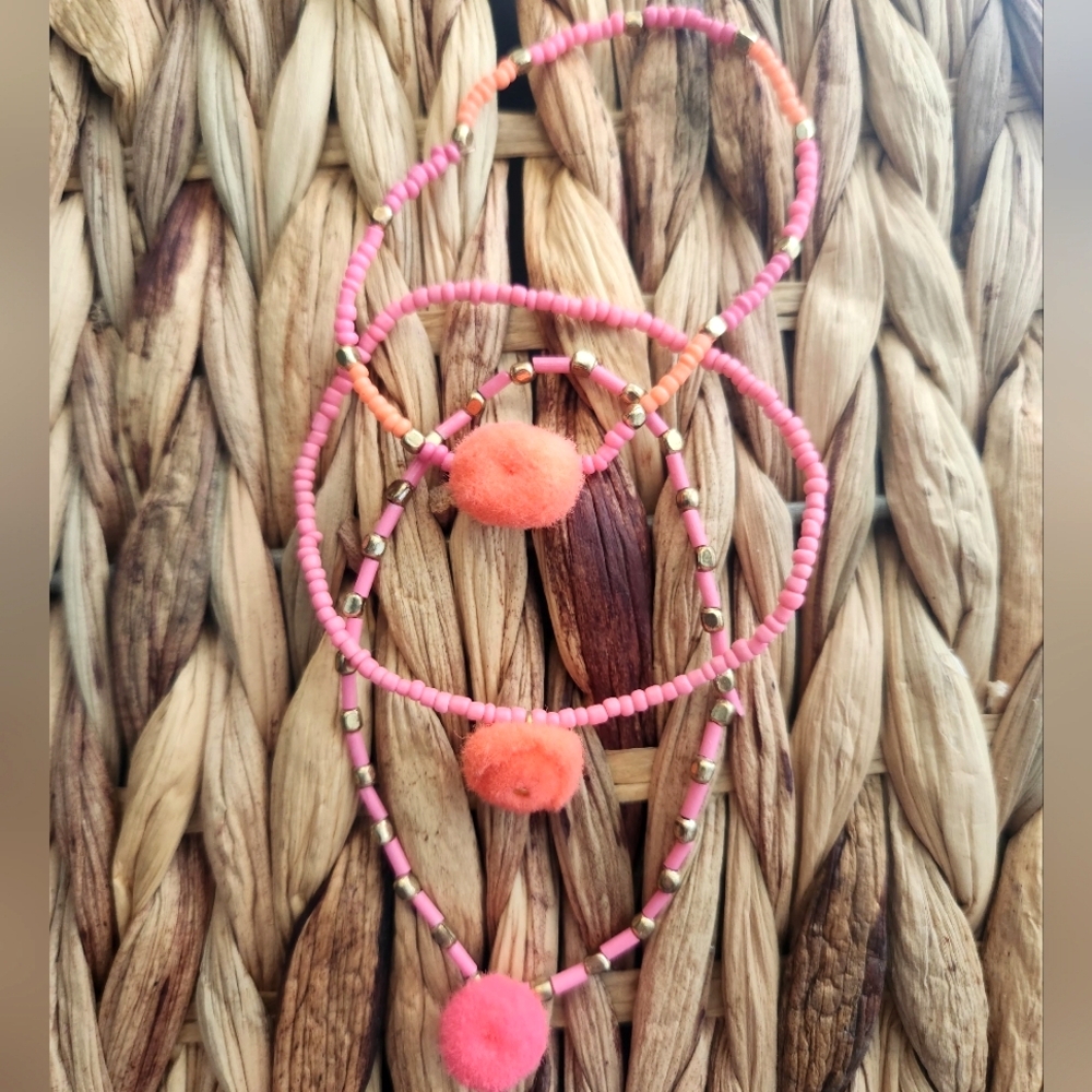 Pink and Peach Beaded Bracelets with Pom Poms